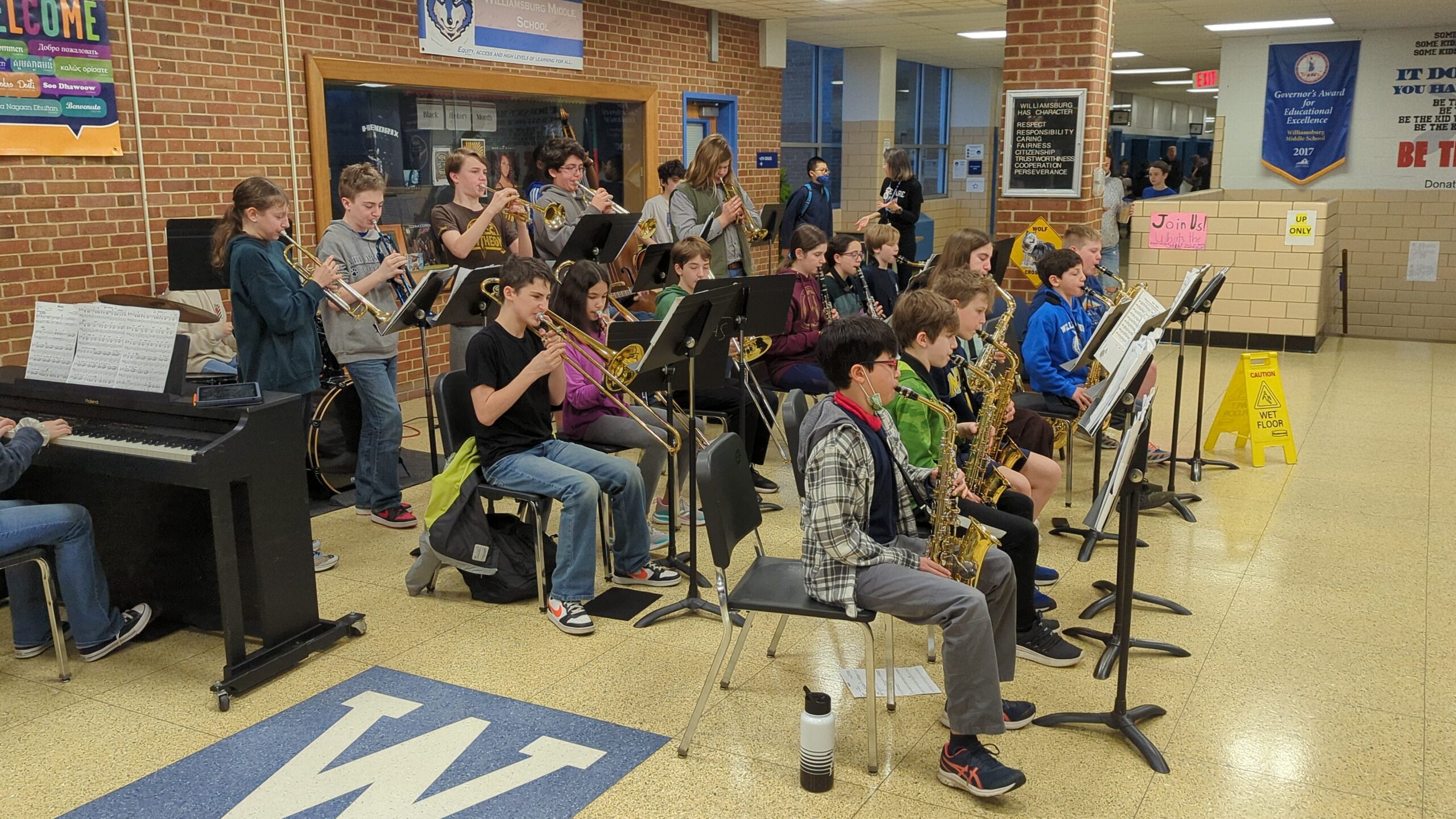 Band students performing in the lobby 